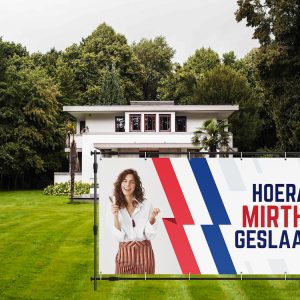 geslaagd spandoek clean tuin